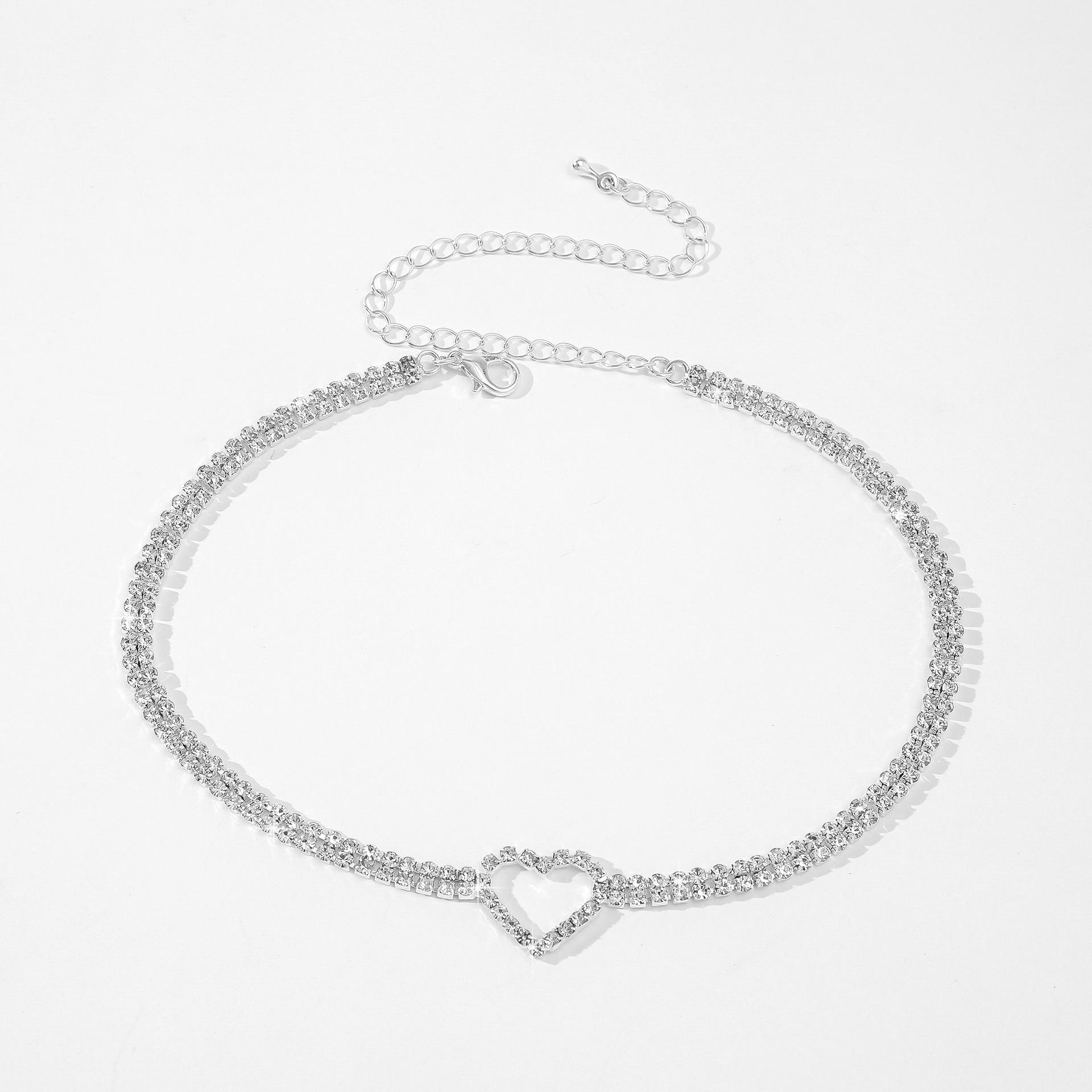 

Элегантное колье-чокер с цепочкой-когтем в форме сердца и инкрустированными бриллиантами - Европейский и американский стиль для женщин серебряный