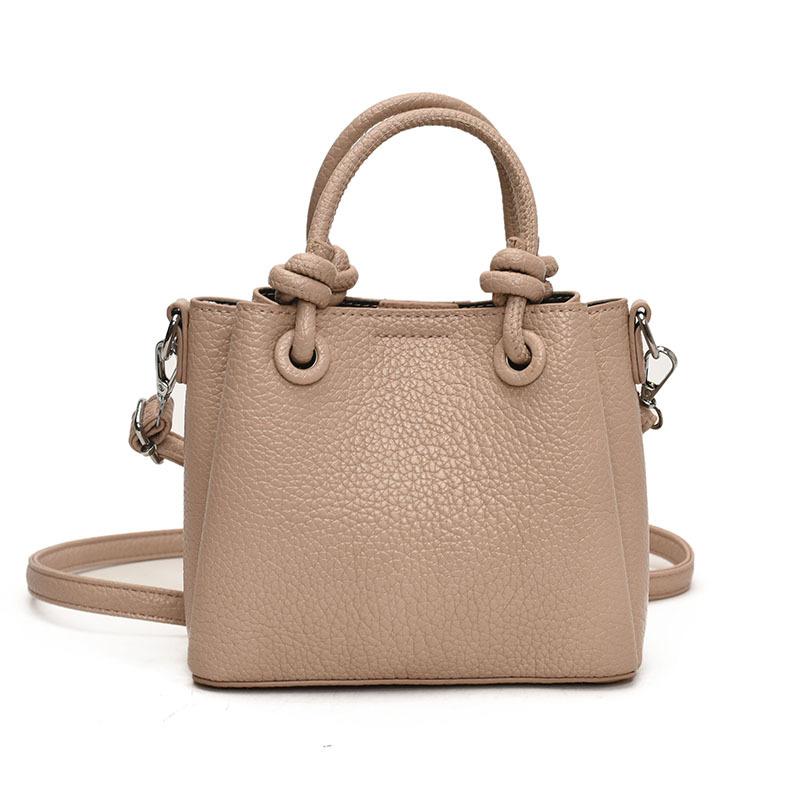 

Hand carry fashionable simple bucket bag spring and summer new trend shoulder bag texture casual messenger bag