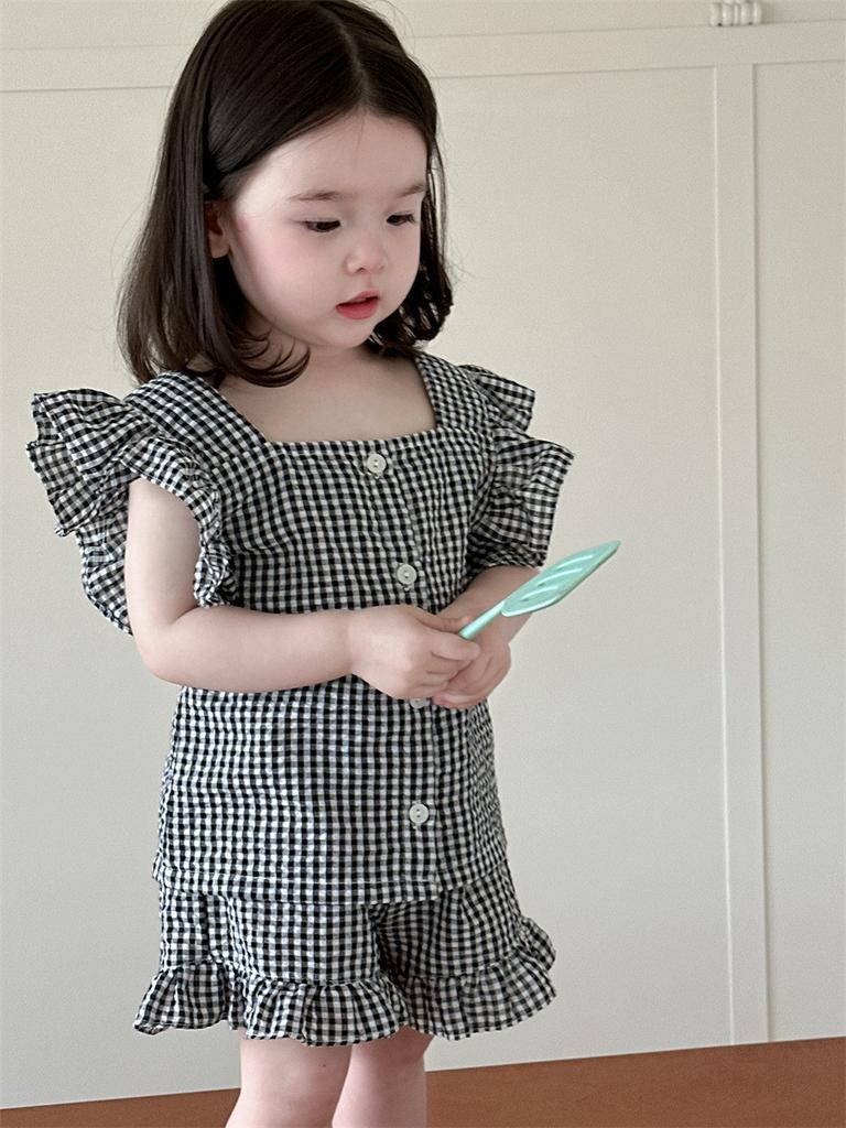 Rozkošný kojenecký letní outfit Dvoudílná sada Roztomilé kreslené bavlněné tričko s krátkým rukávem a šortky pro kojence v černém a kávovém kostkovaném vzoru