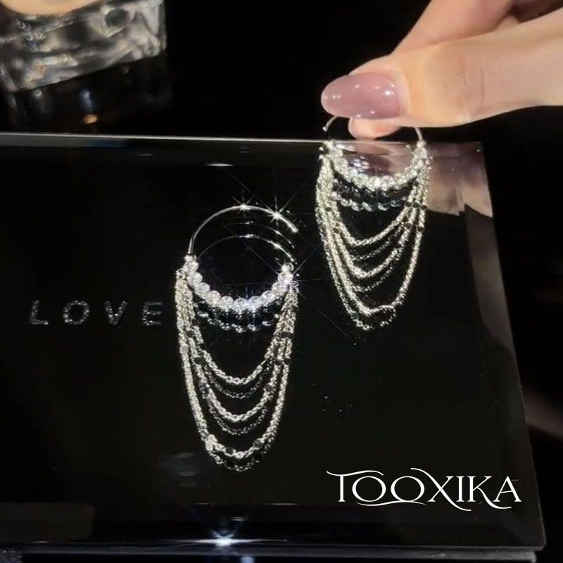 

Fashionable Ladies Earrings with a Light Luxury Temperament and Zircon Fringe Pendant