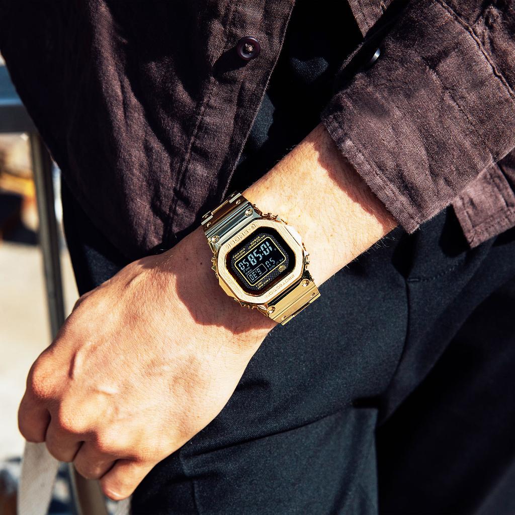 Casio Montre Numérique à Quartz pour Homme en Acier Inoxydable Résistante à l'Eau 200M et aux Chocs GMW-B5000GD-9