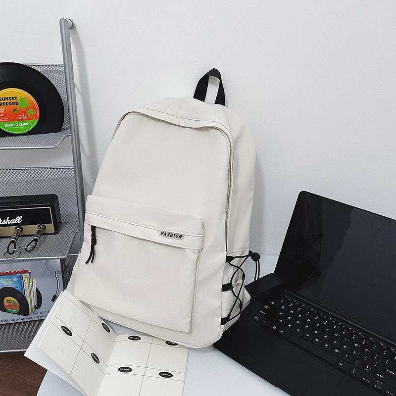 New Casual Backpack Simple College Style Backpack Large Capacity Student Bag Men and Women Couple Bag Travel Bag