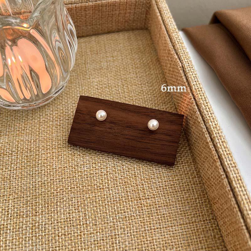 

Silver needle high-brightness pearl stud earrings for women s new high-end mini earrings, niche design temperament earrings for women