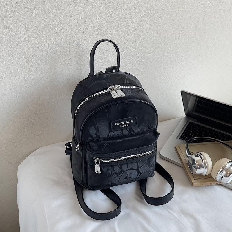 Fashion travel small bag women's new versatile student backpack backpack after going to work