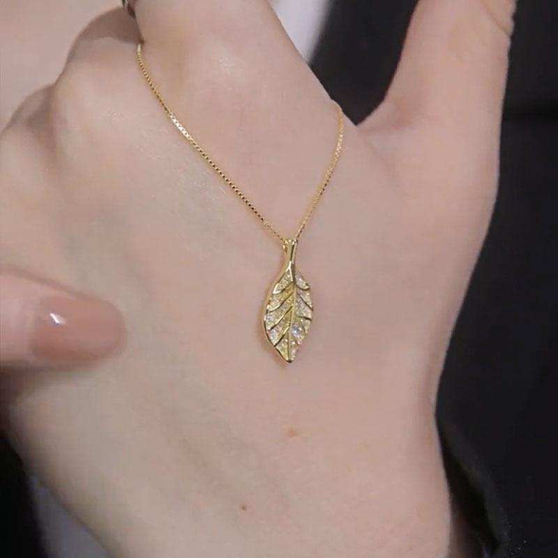 Gold Jade Leaf Necklace Women’s Fashion - Elegant Design with Full Diamond Accent.