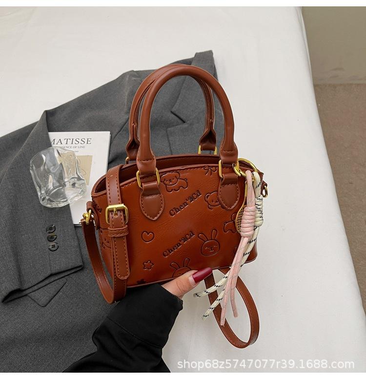 High-end Texture Small Bag Women's 2025 New Fashion Embossed Handheld Bucket Bag Versatile Commuter Crossbody Bag
