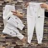 Women Spring and Autumn High Waist Plus Size Harlem Pants Loose and Slim Skinny Zipper Pants Sports Casual Trousers Female