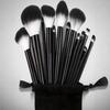 Compact 13-Piece Makeup Brush Set: Black & White, Soft Bristles for Foundation, Eyeshadow, Eyebrow, and Concealer.