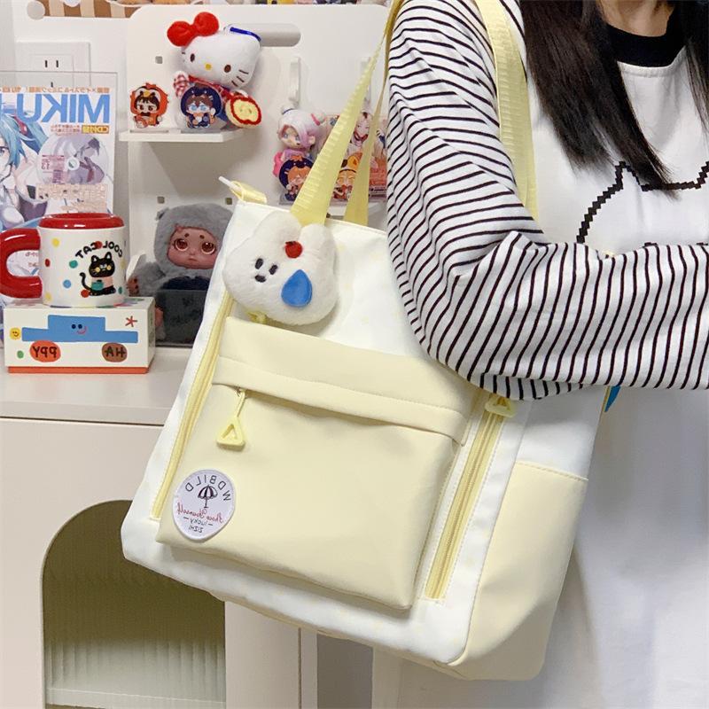 Neue süße Windkontrastfarbe Schultertasche große Kapazität frische niedliche Handtasche Student Pendeln Klasse Umhängetasche Frau