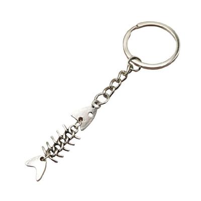 Charme Pendentif Porte-clés Os de Poisson Élégant Accessoire de Mode Poli Portable pour une Prise en Main Confortable et la Durabilité
