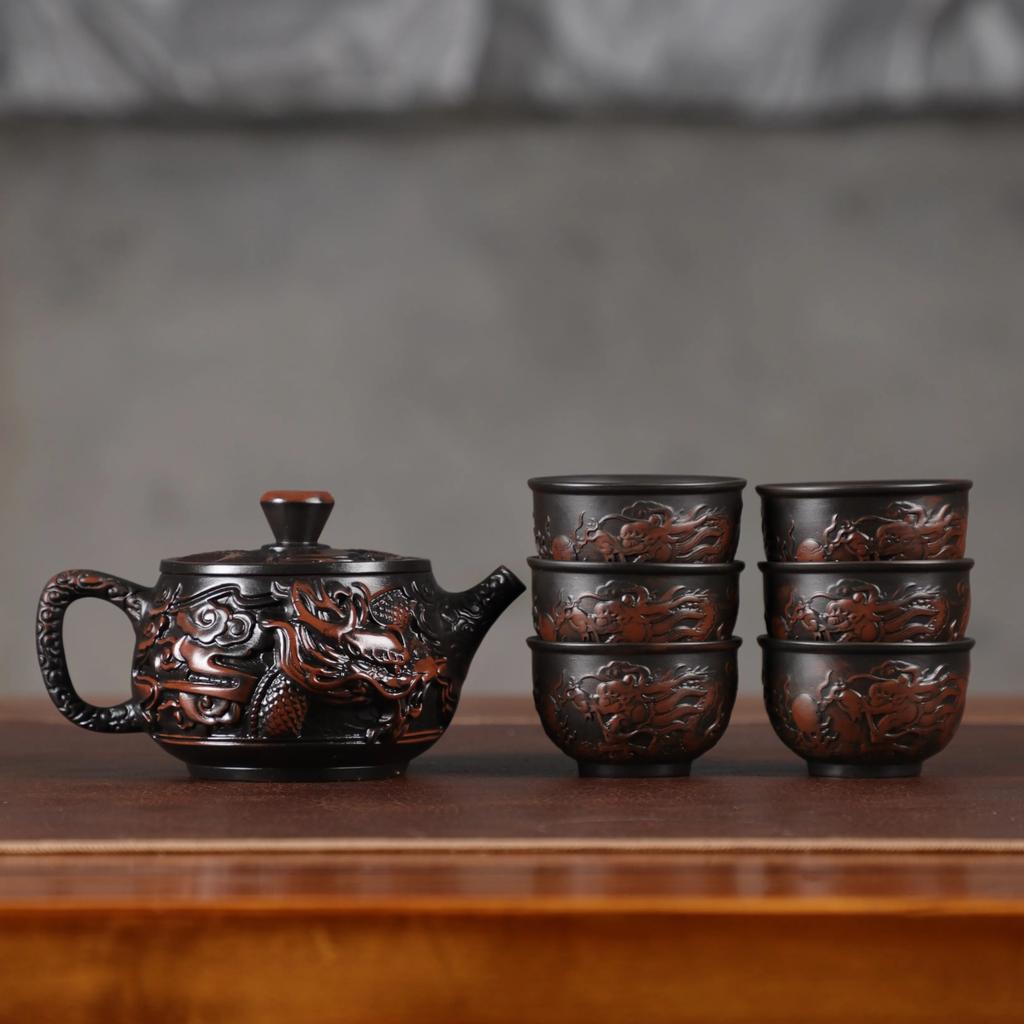 Teapot purple pottery material large capacity pure hand-carved retro relief desktop ornament household Chinese gift rotary pot