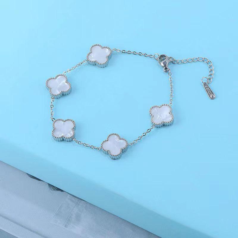 

Браслет с четырьмя листами клевера с двухсторонним титановым сплавом, который не выцветает, и пятью цветочными мотивами, простой и универсальный браслет белый