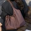 Retro commuter niche bow single shoulder armpit bag 2025 Korean version new fashion simple contrasting color tote bag