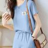 Completo due pezzi da donna: T-shirt casual e pantaloncini con coulisse