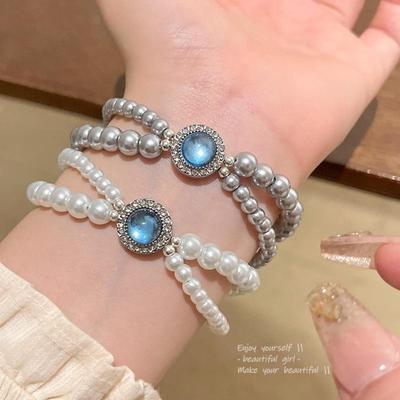 Koreanisches verträumtes blaues Zirkon- & Perlenarmband für Damen - Elegantes Kreuzdesign