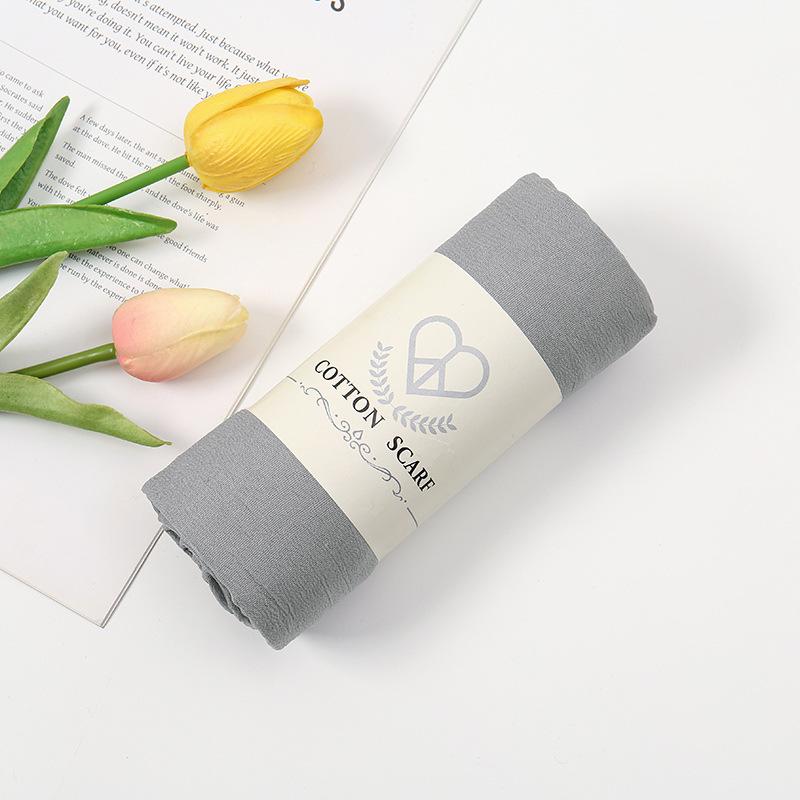 Autumn and winter new micro-elastic crumpled cotton blended long towel right angle lock edge polyester headscarf hot-selling solid color scarf