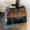 Versatile fashion leopard print niche diamond chain bucket bag 2025 femininity explosion casual portable messenger bag
