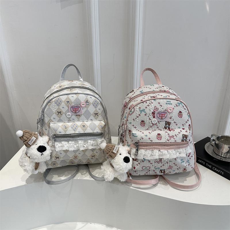 Schoolbag high-end sense large-capacity cartoon backpack bag female 1011 new travel backpack college student class schoolbag