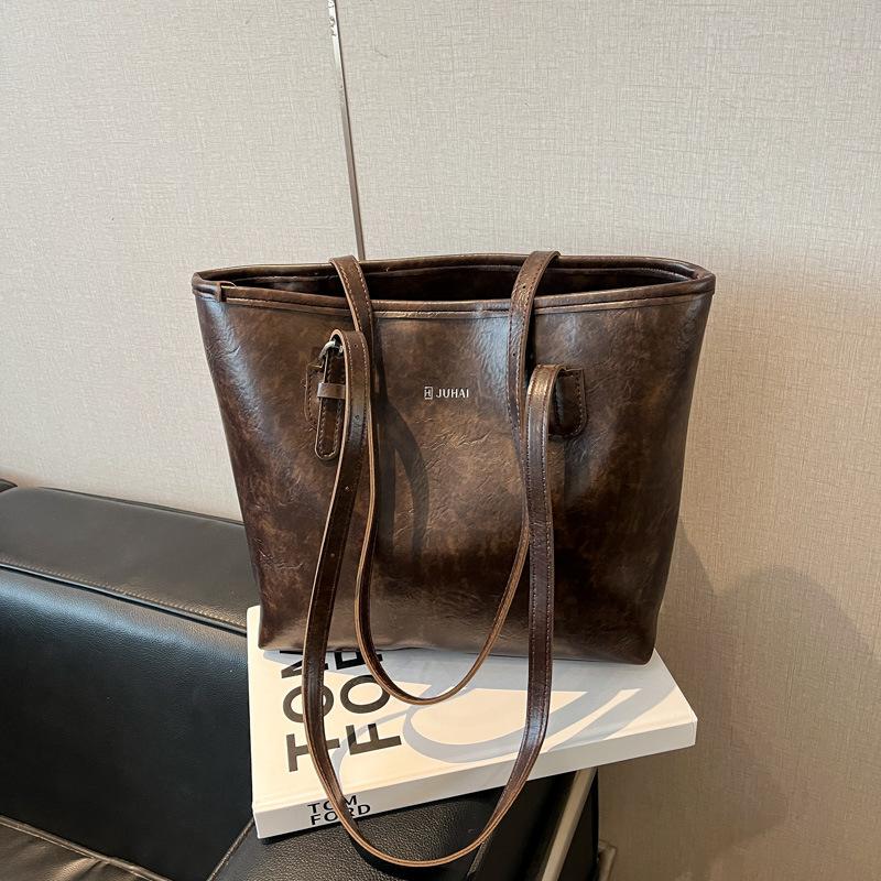 

Fashion retro style oil wax pitot bag women s trendy versatile commuter high sense large capacity shoulder armpit bag