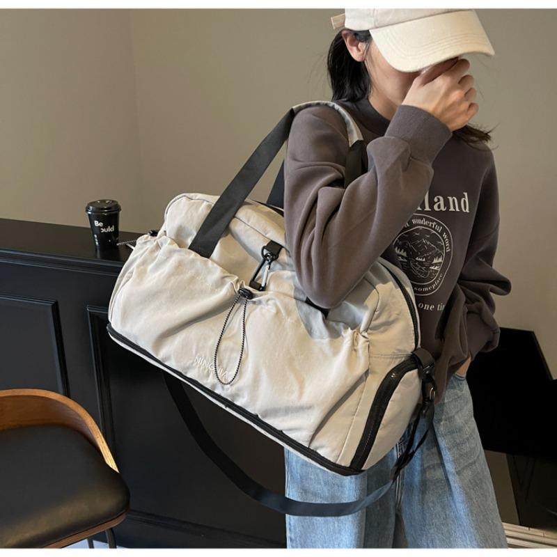 Large capacity messenger business travel luggage women's new leisure sports fitness portable short-distance travel bag