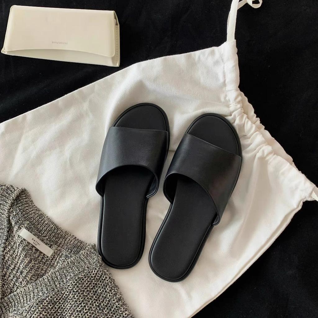 Leather niche row style one-word slippers women's outer wear summer new comfortable flat bottom soft bottom beach half tray sandals
