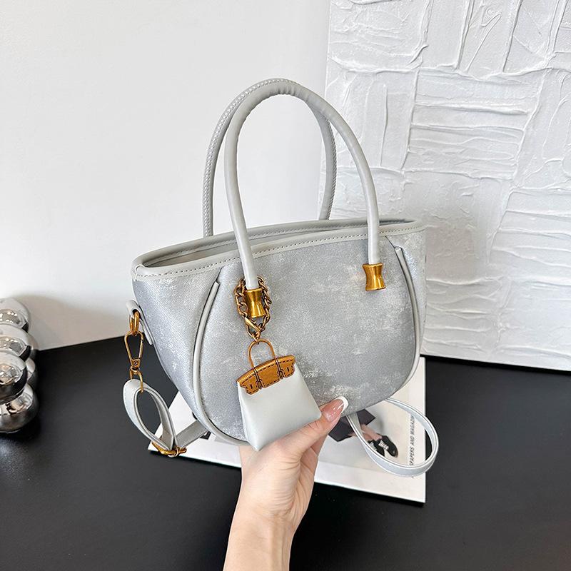 Niche design retro handbag women's new fashion versatile shoulder messenger bag bucket bag