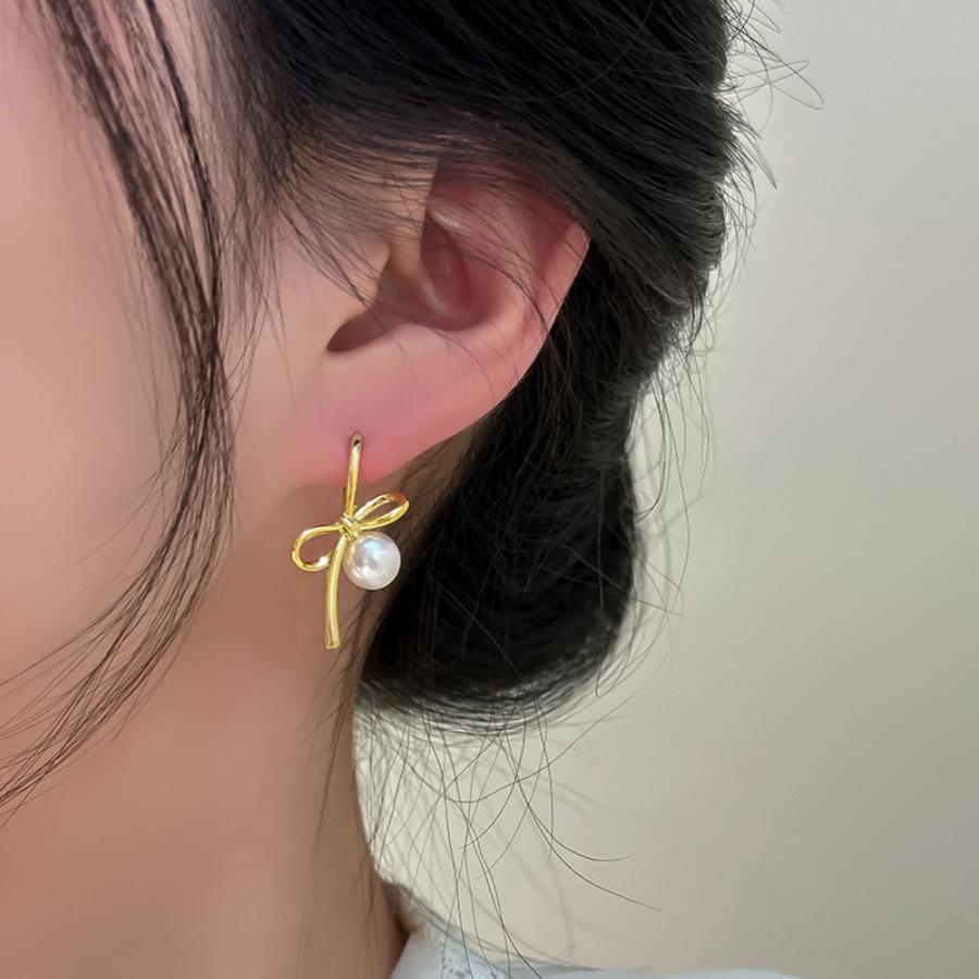 Eleganckie kolczyki z perłową kokardą w stylu francuskiego dworu dla kobiet