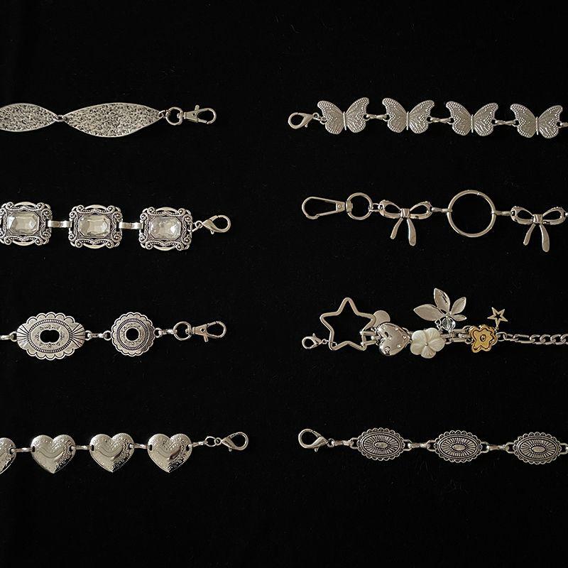 2024 High-End-Hüftkette aus Metall mit Liebesschleife und geprägtem Gürteldesign für Damen