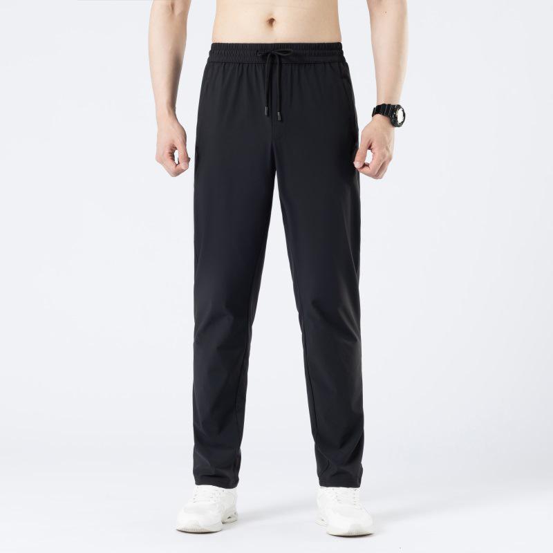 

Men s Summer Ice Silk Casual Pants: Youthful, Loose, Straight-Leg, Solid Color, Elastic. 4XL