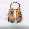 Elegant Sequin Embroidered Straw Woven Bucket Bag with Bamboo Handle - New Arrival Summer Trend Unique Crossbody Bag for Women