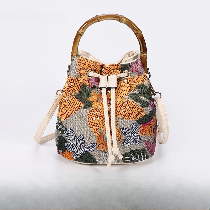 Elegant Sequin Embroidered Straw Woven Bucket Bag with Bamboo Handle - New Arrival Summer Trend Unique Crossbody Bag for Women