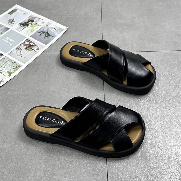 Leather bag head slippers women's outer wear 2025 spring and summer new retro woven hollow one pedal lazy drag