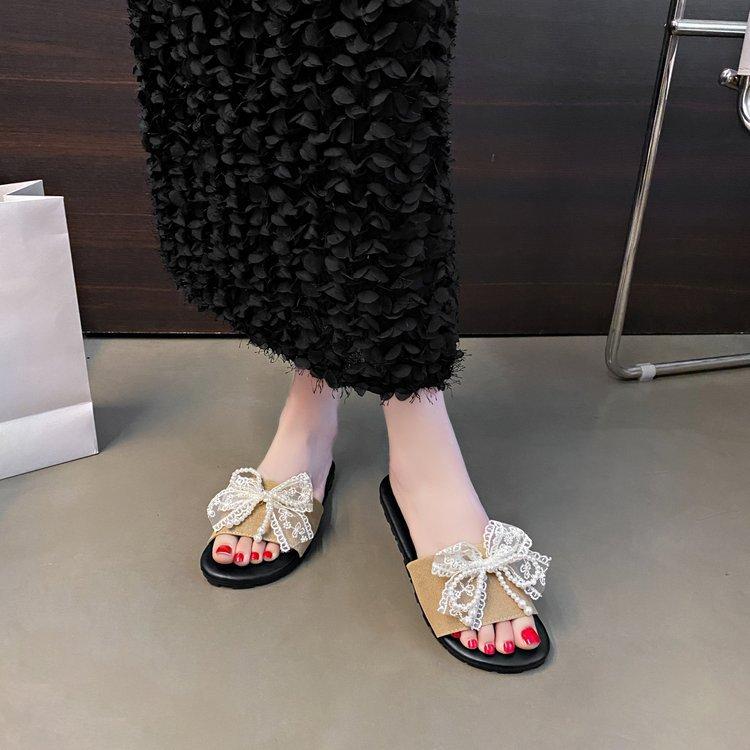 

Foreign trade bow lady cool slippers summer 2025 new pearl sandals French lace fashion slippers women 43 абрикосовий
