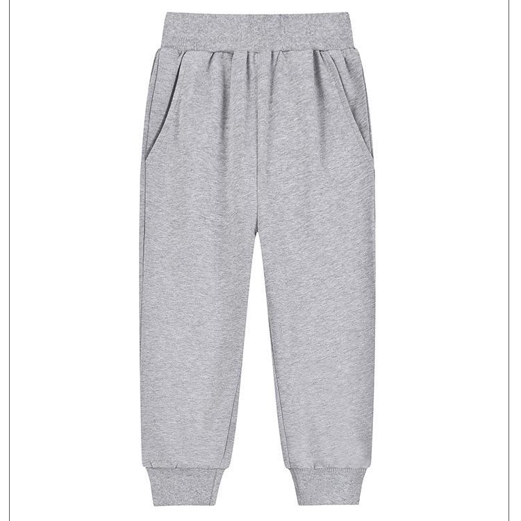 Tmavě modré školní sportovní kalhoty z čisté bavlny pro žáky prvního stupně - chlapci a dívky, volný střih, letní kalhoty.