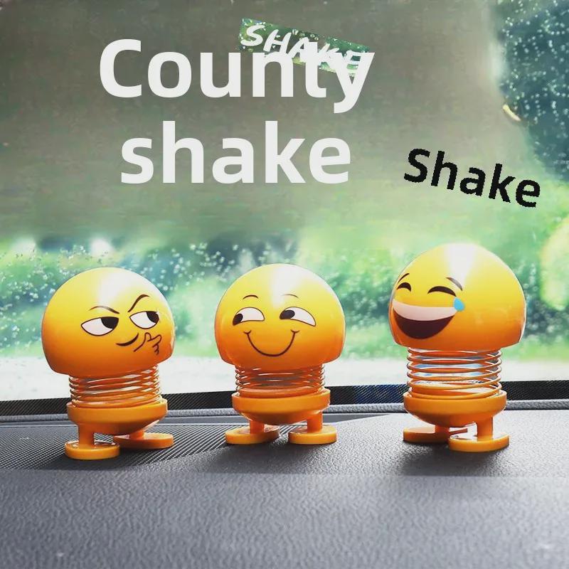 Kreative und niedliche Frühlings-Wackelköpfe Autoornamente - Cartoon-Ausdrücke für die Innendekoration