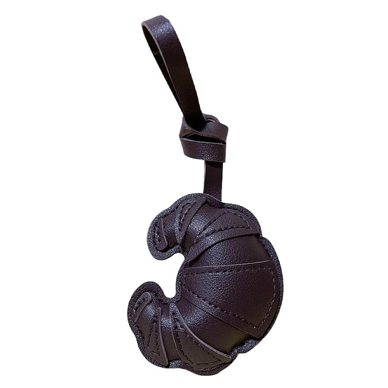 

1 шт. Подвески для сумки Элегантный дизайн из кожаного шнура Шармы для сумки Брелоки Высококлассные подвески для мобильного телефона Милые разноцветные темный кофе