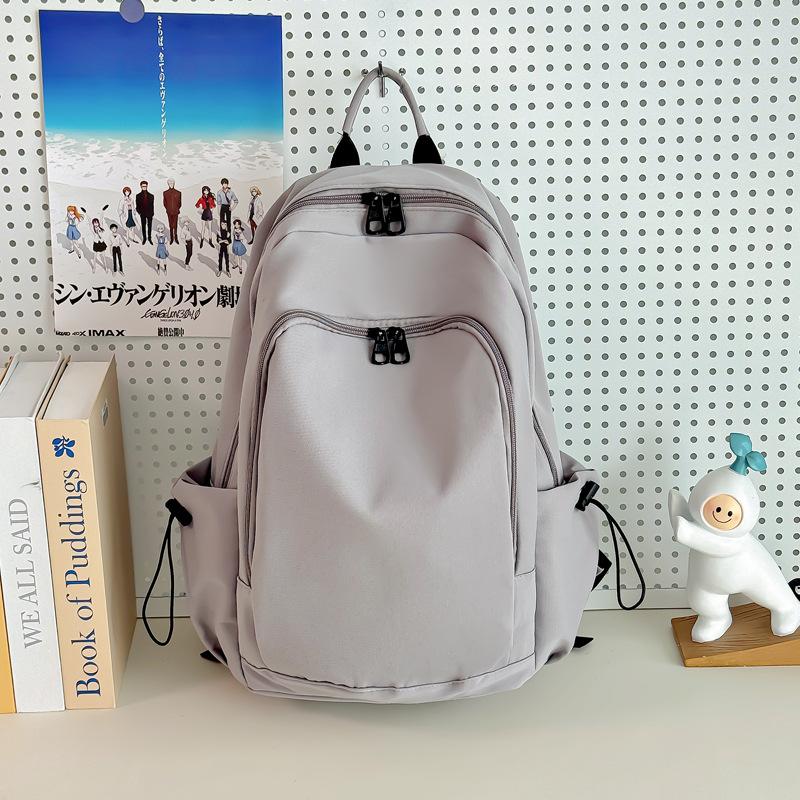 

Простой и универсальный рюкзак женский через границу корейская версия ins дорожная сумка рюкзак женский высокая стоимость школьная сумка для ученика средней школы серый