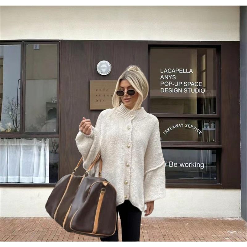 Cárdigan de punto de manga murciélago casual de color sólido con botón metálico