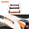 Quadros e acessórios para motociclos – Alças para motociclos