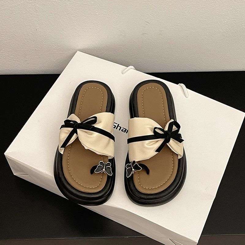 Thick bottom heightening bow toe women's outer wear in summer 2025 new fashion versatile casual beach cool slippers