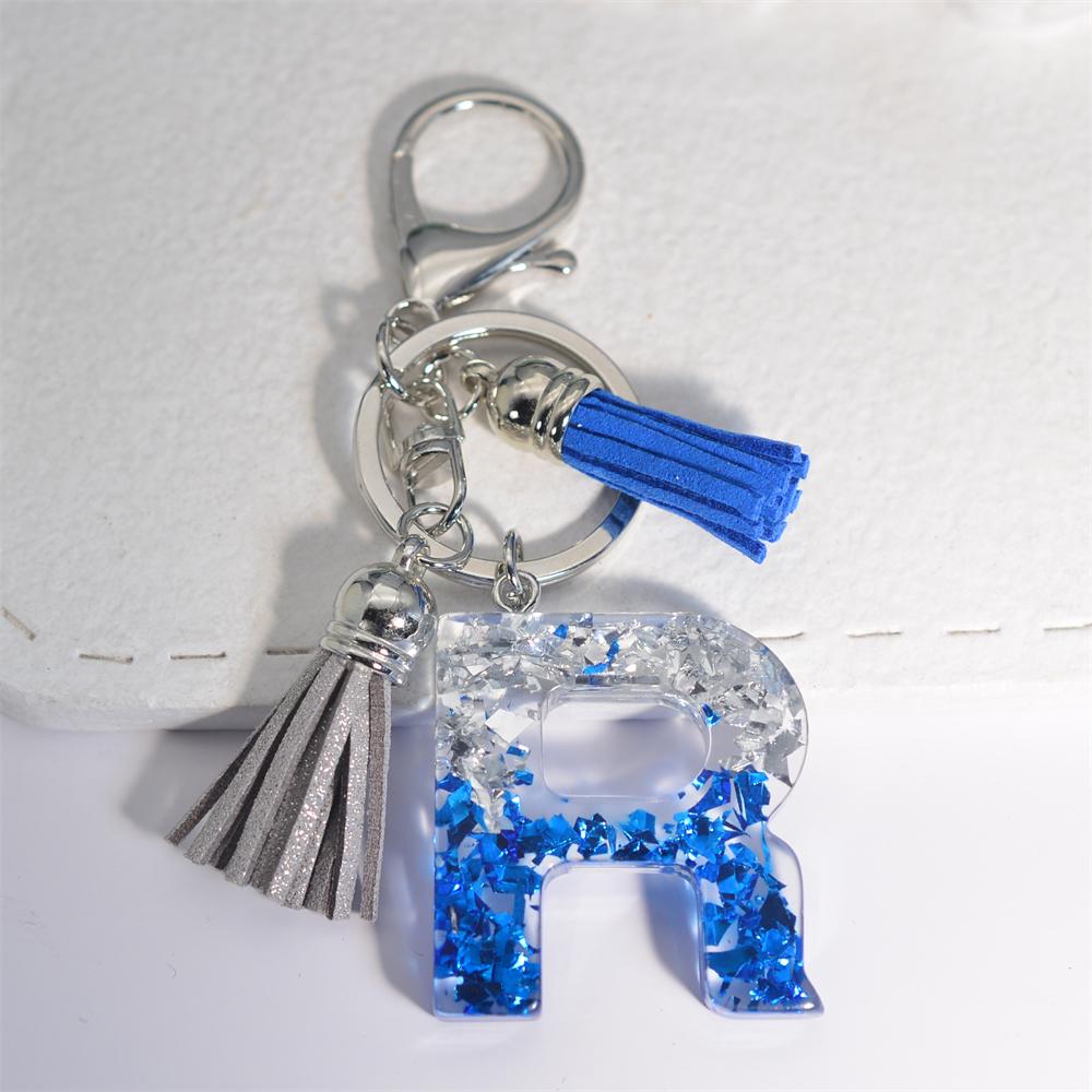 Креативные брелки из смолы с 26 буквами и кисточками — фото 24