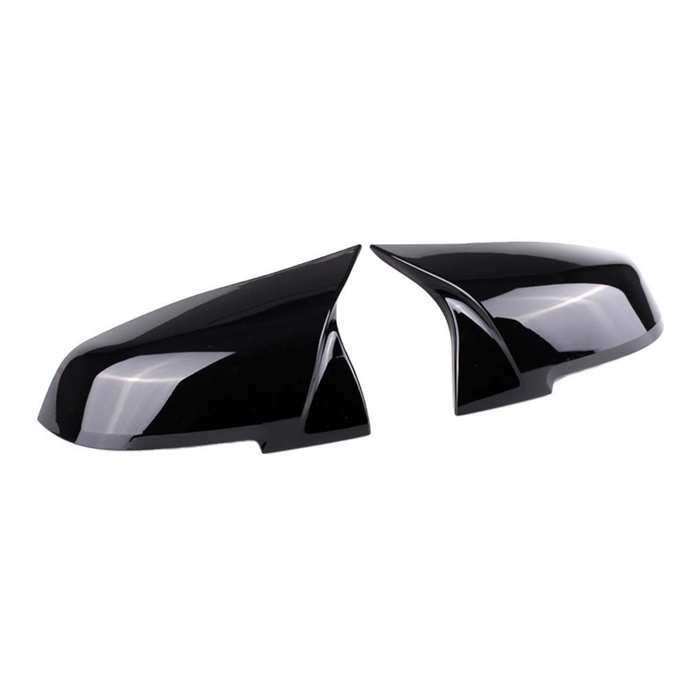 BMW 5 Series F10/F18 Horn Style Rearview Mirror Housing Backup Camera Cover, Glossy Black Carbon Fiber Pattern.