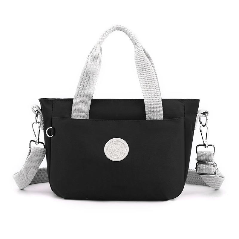 

New women s shoulder bag trend contrasting color messenger bag commuter portable makeup backpack чорний