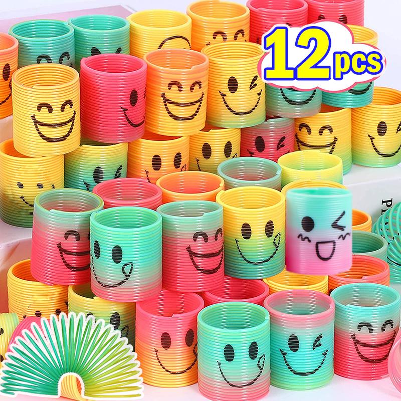 12PCS Children's Colorful Spring Ring Toys Mini Smiling Face Elastic Rainbow Ring Magic Toys Children's Birthday Party Gifts