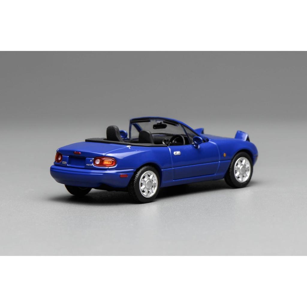 FREESTYLE MOTORHELIX 1/64 Mazda Eunos Roadster NA RHD Laguna Blue Diecast Model Car M60202R
