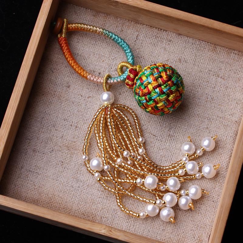 Number 16 Handmade Tassel Accessory with Ball Charm, Pearl, and Spinel Details.