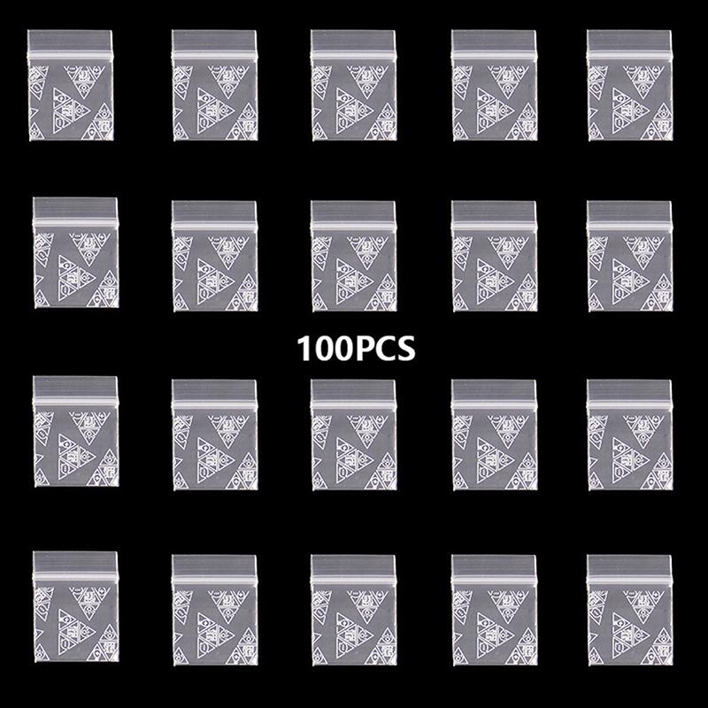 100 st Liten blixtlåsväska Smile Skull Mönster Bärbar förvaringsväska Transparent