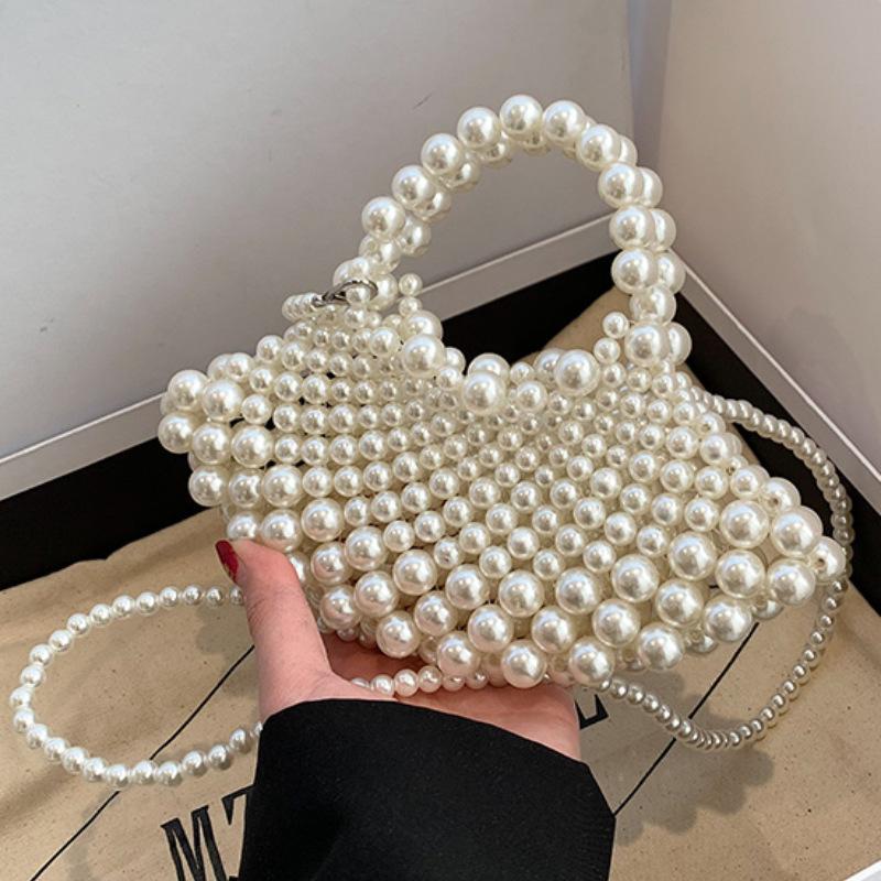 Bag summer new 2025 Mori foreign style Internet celebrity pearl woven bag ins wind one shoulder oblique fairy beach bag