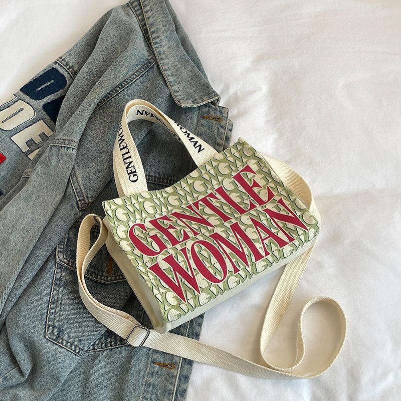 

Fashion alphabet canvas shoulder bag 2025 new casual and beautiful foreign style messenger going out portable messenger small square bag зелёный