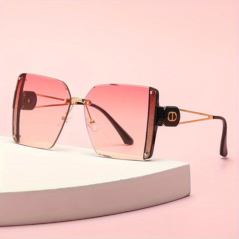 Fashion trend new women's frameless edge cutting metal sunglasses Fashion travel sunshade sun protection sunglasses